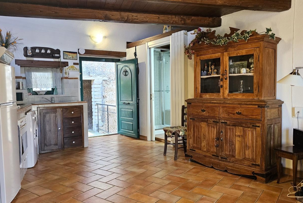 Soggiorno con angolo cottura