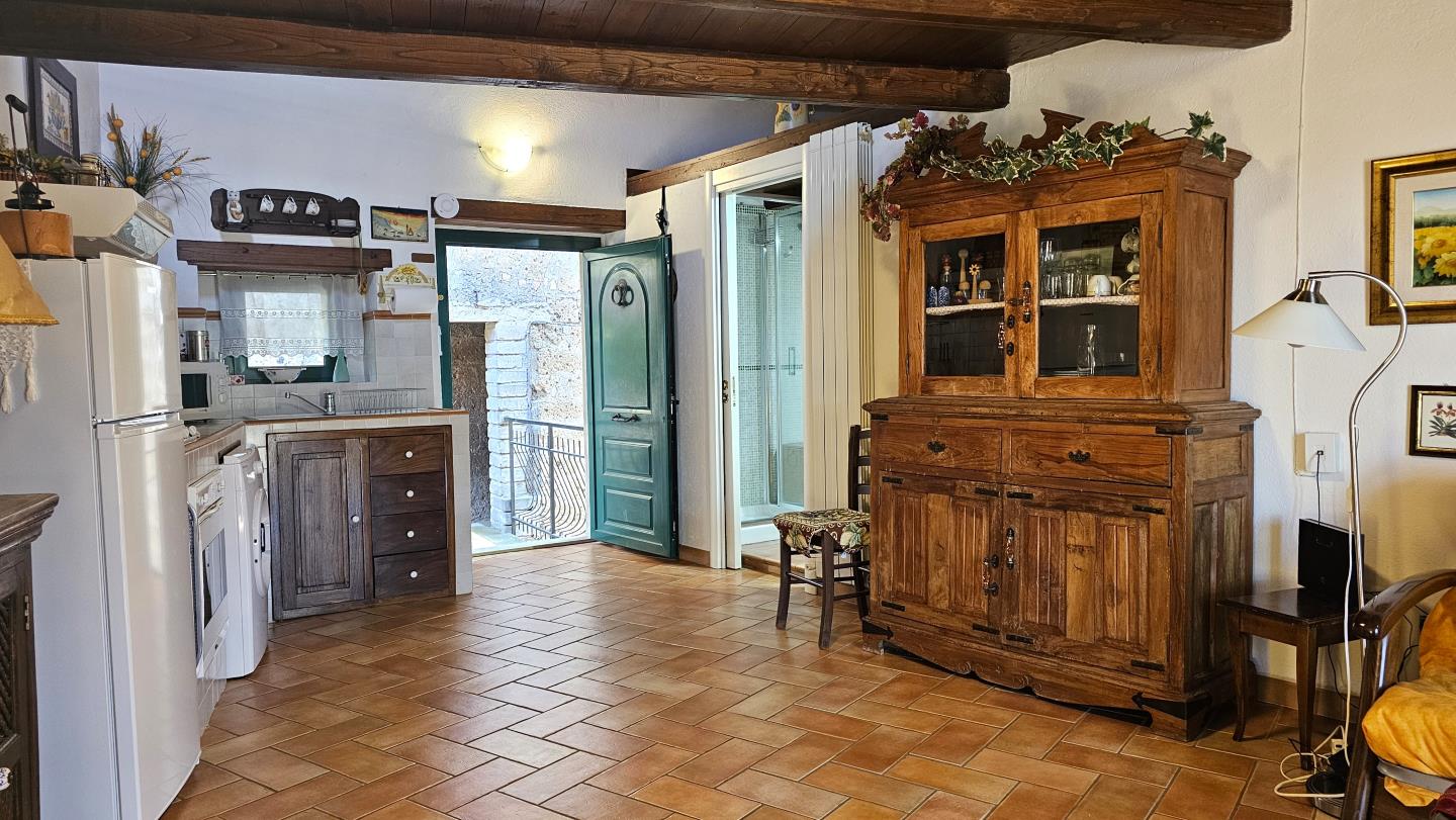 Soggiorno con angolo cottura