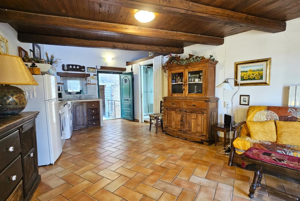 Soggiorno con angolo cottura
