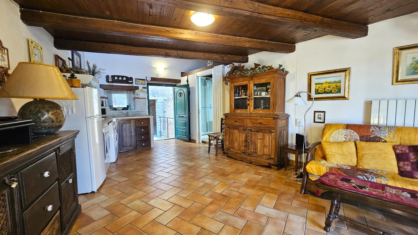 Soggiorno con angolo cottura