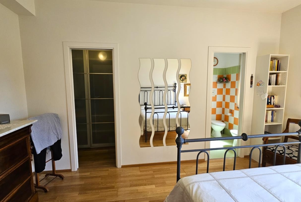 Camera con bagno e cabina armadio