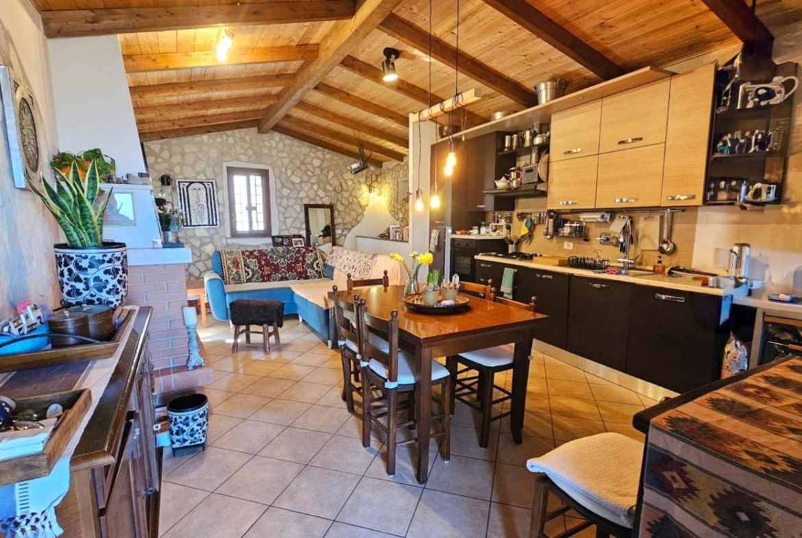 Soggiorno con angolo cottura