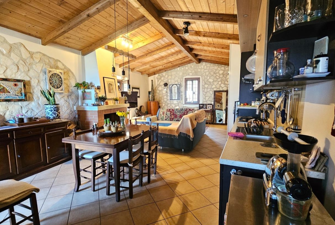 Soggiorno con angolo cottura