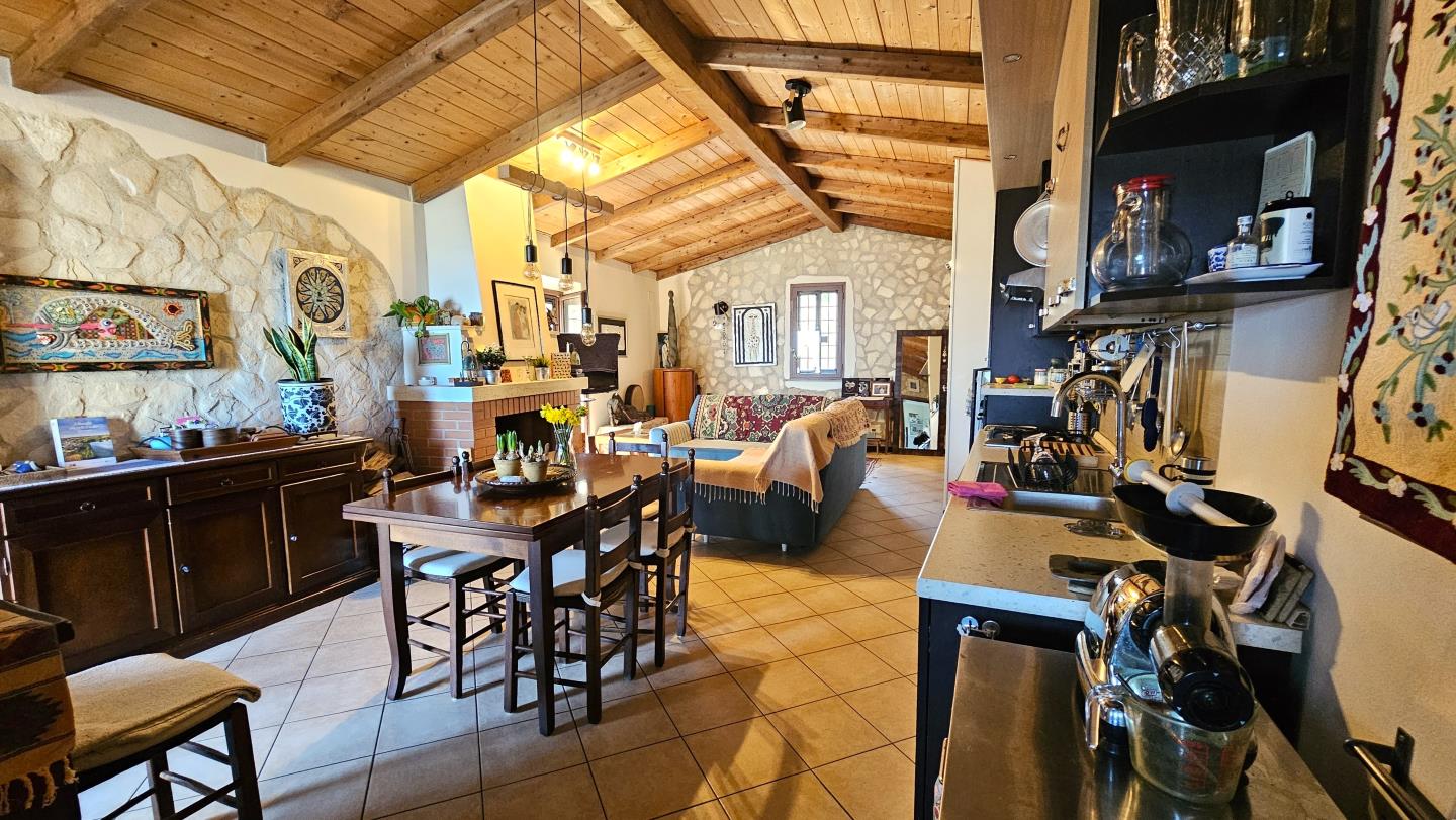 Soggiorno con angolo cottura