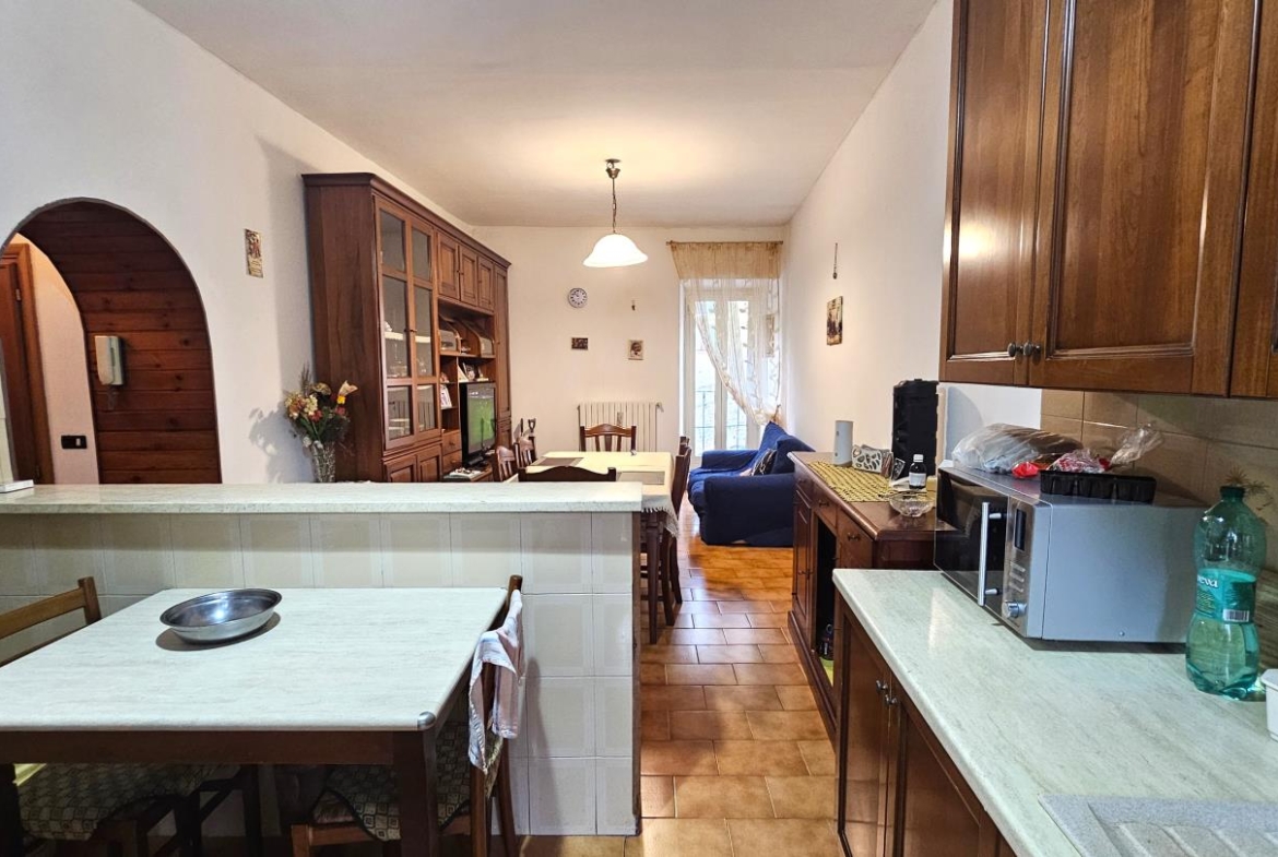 Soggiorno con angolo cottura