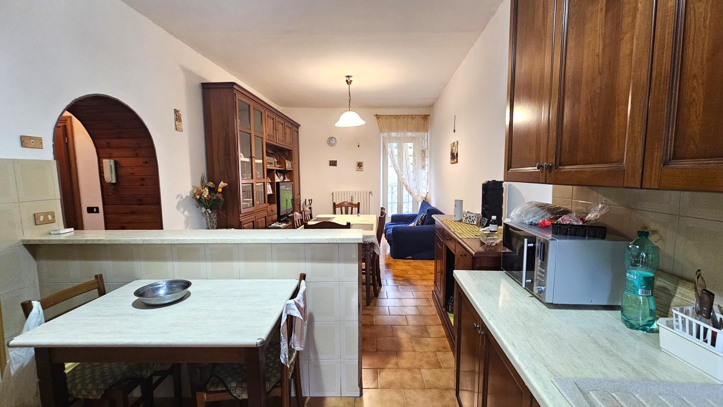 Soggiorno con angolo cottura