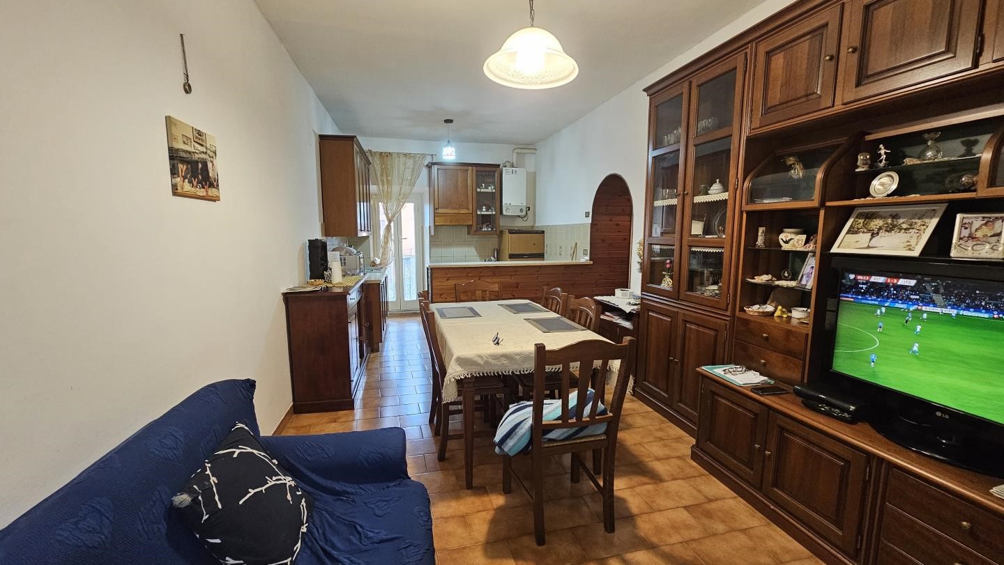 Soggiorno con angolo cottura