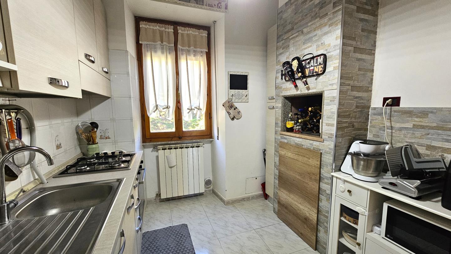 Cucina con camino